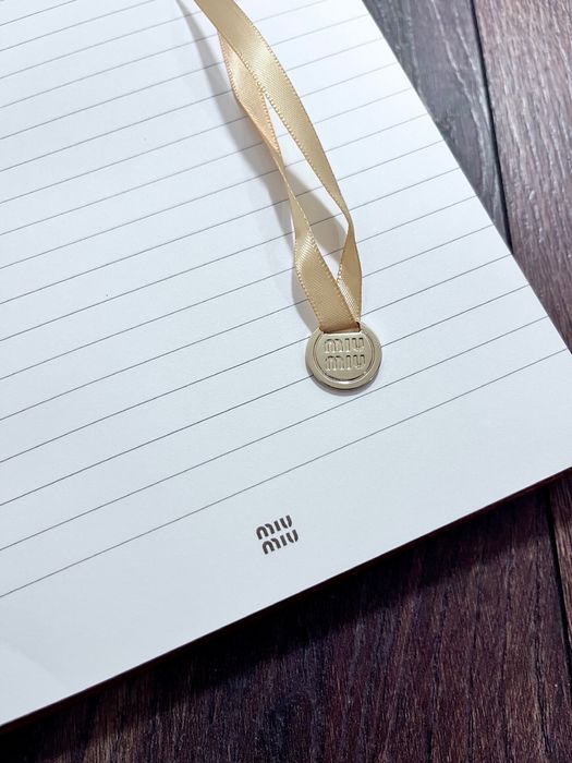 Блокнот Миу.