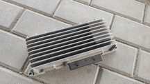 AA WZMACNIACZ AUDI A6 C6 4F0910223K