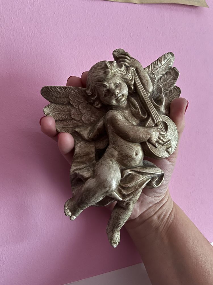 Peça de decoração em forma de anjo