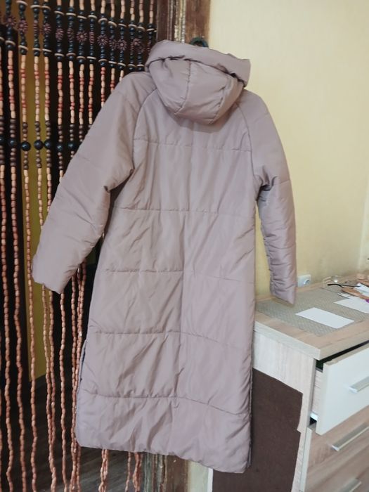 Пуховик новый,размер 46на 48 ,шикарный теплый,согреет в холодные зимни