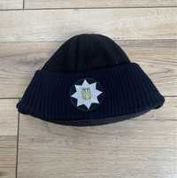 Зимова шапка поліція