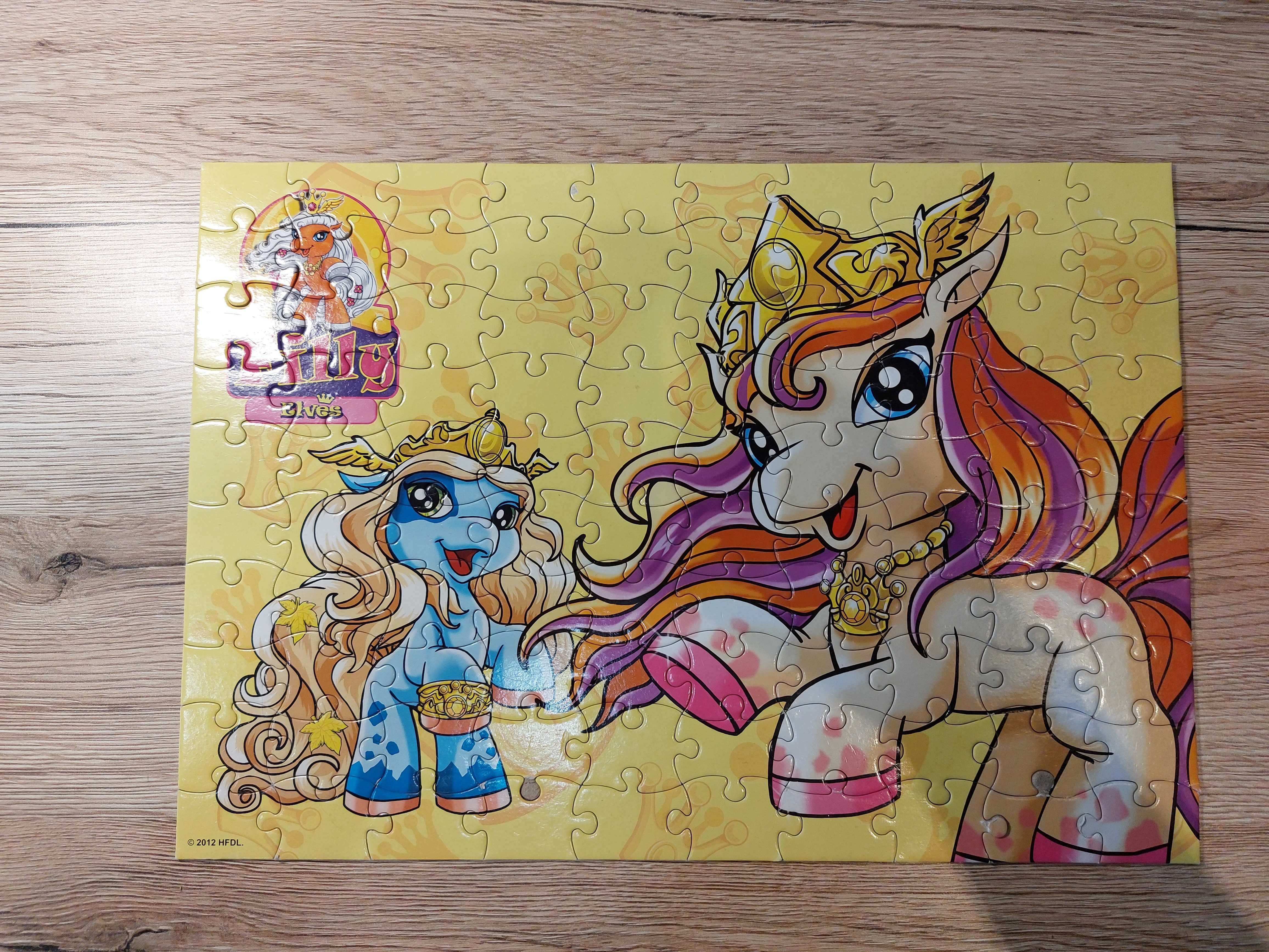 puzzle koniki Filly dwa zestawy po 100 szt.  używany