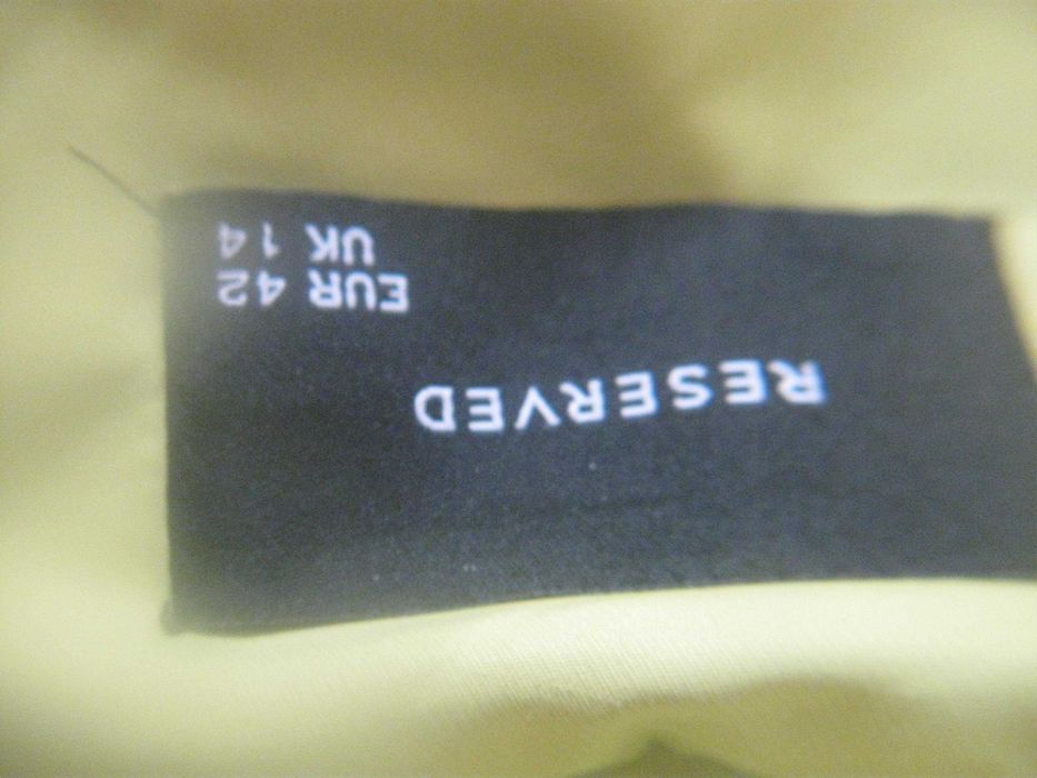 Зимній жіночий пуховик ,відмінний стан.