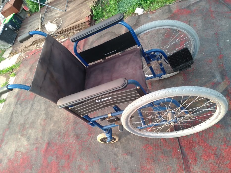 Инвалидная коляска искра.