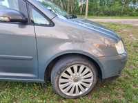 PRAWY BŁOTNIK przedni szary przód VW Touran 2006r LA7X