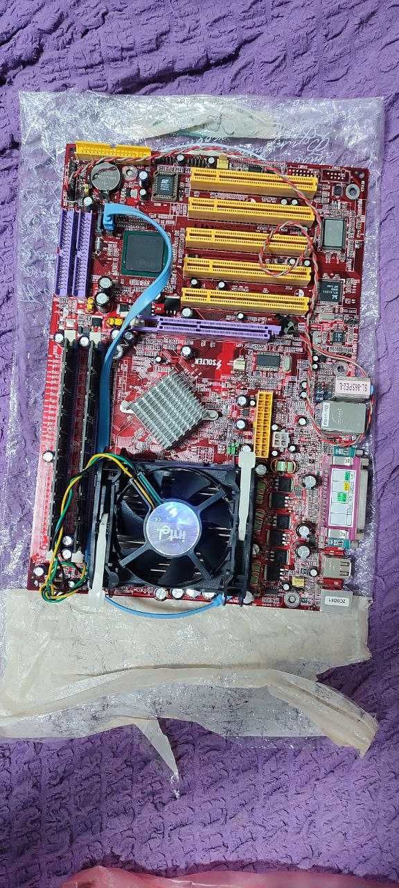 Материнскі плати Soltek SL-86SPE2 L та GIGABYTE GA-MA69VM-S2