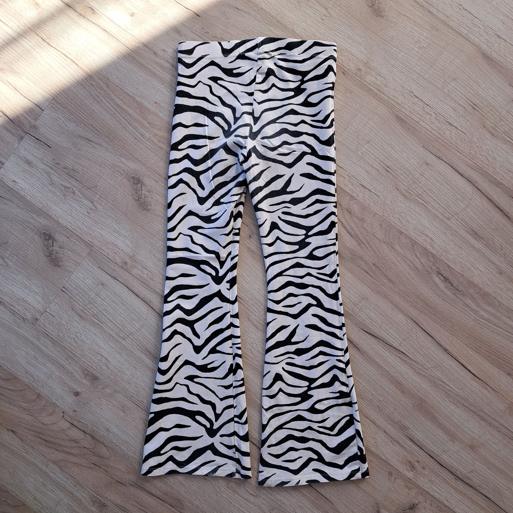 Dziewczęce legginsy flare zebra Marks&Spencer, rozmiar 152