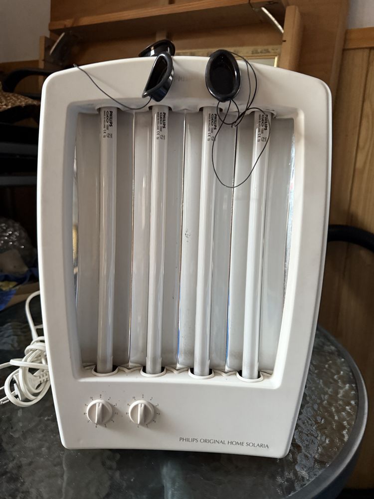 Solarium na twarz i dekold Philips