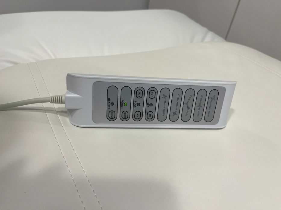 Fotel kosmetyczny elektryczny Unico Plus z podgrzewaniem biały Kazaro