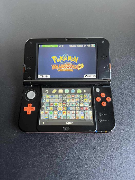 New Nintendo 3DS XL Preta/Laranja IPS com 100+ Jogos