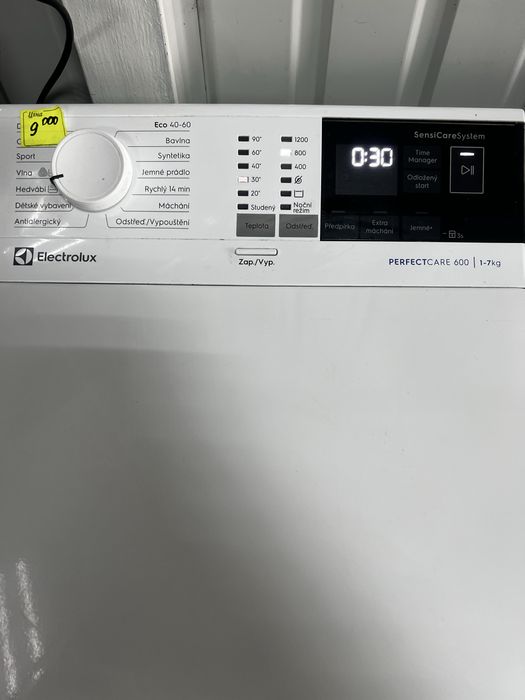 Пральна машина з верхньою загрузкою електролюкс