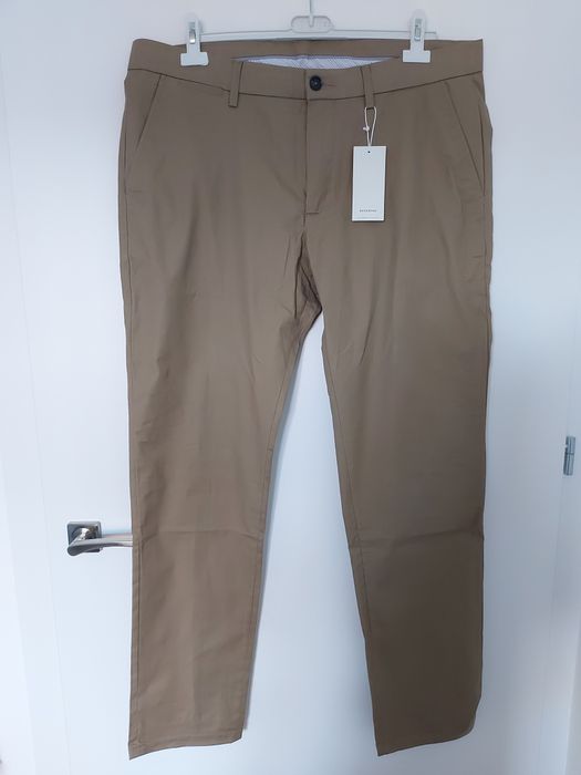 Bawełniane spodnie męskie beżowe Reserved rozm. 36