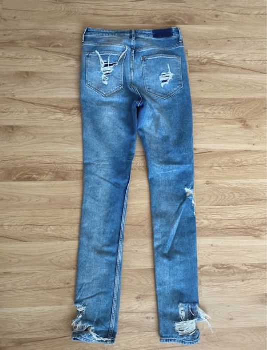 Jeansy spodnie z dziurami h&m z wysokim stanem