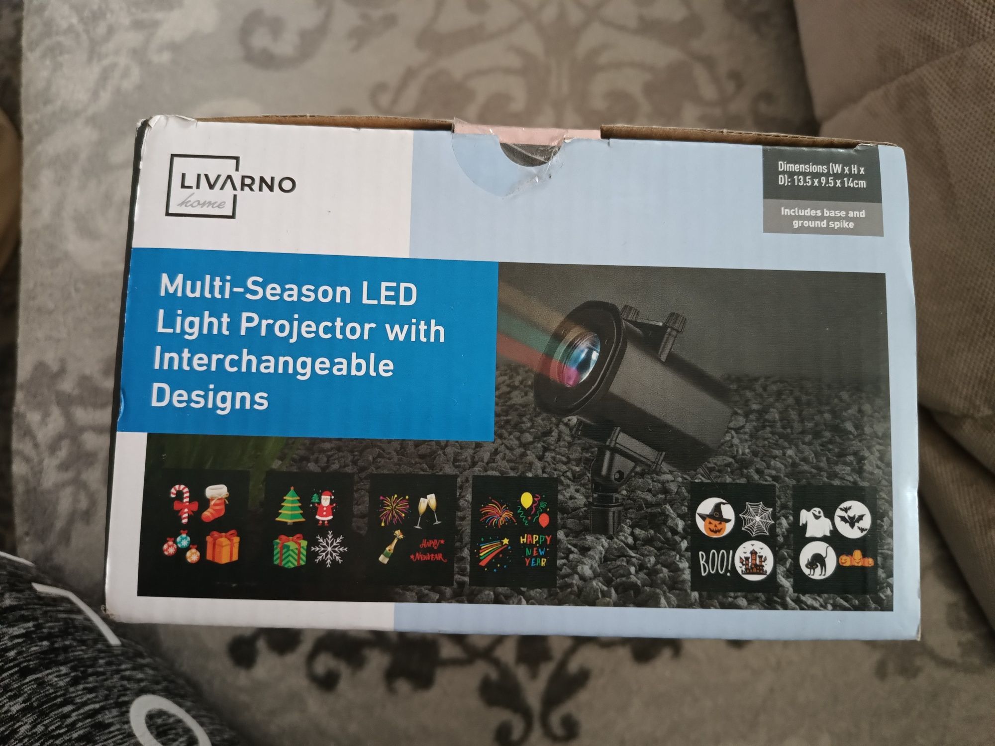 Reflektor LED z wymiennymi motywami święta nowy rok