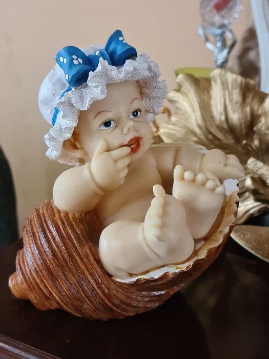 Skarbonka dziecko w muszli