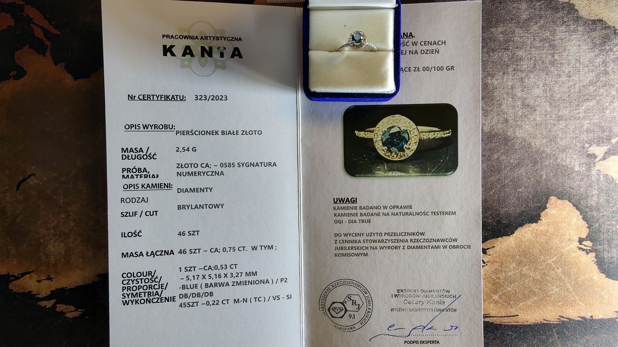 Pierścionek białe złoto z diamentami niebieski - Certyfikat