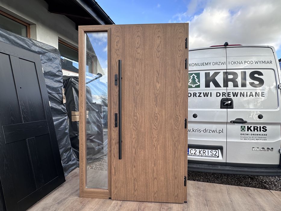 Drzwi zewnętrzne drewniane dębowe z doświetlem i antabą montaz Polska