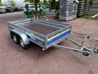 Przyczepa VESTA LIGHT TANDEM 30DA 300x150x37 cm 2 osie DMC 750 kg WYSOKIE BURTY spawana rama Wrocław MOTOMUS  Nowa przyczepa Vesta 2 osie 750kg 300x150x37 spawana mocna dostawa