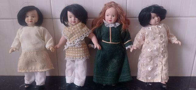 4 bonecas em porcelana