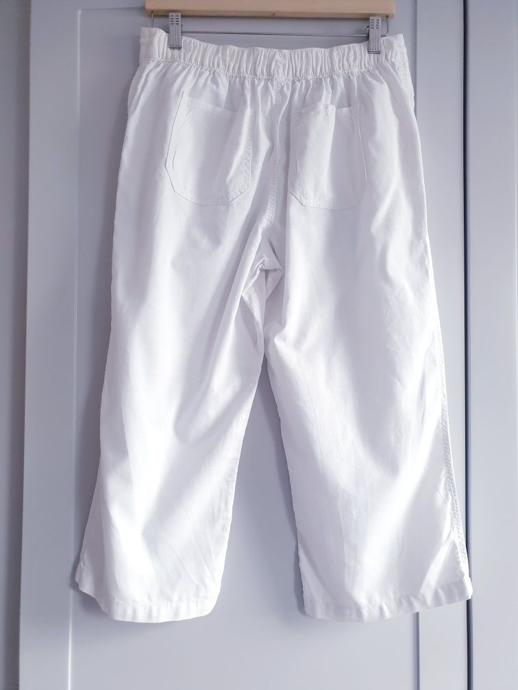 Białe lniane spodnie kuloty bermudy spodenki 40 rybaczki