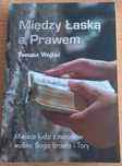 Tomasz Wojtaś Między łaską a prawem