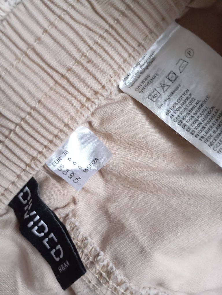 H&M Dividef 38r Luźne beżowe spodnie cargo  z bawełnianego płótna