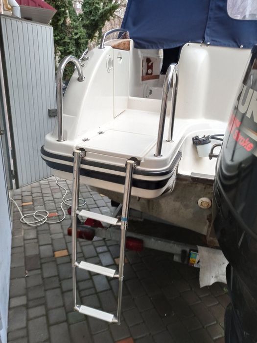 Моторний човен Mirage 660 з каютою і мотором Suzuki 250