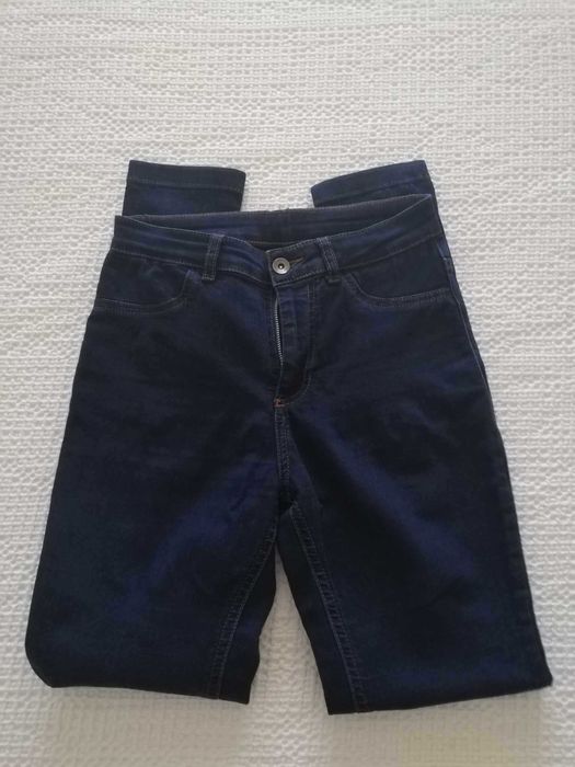Legging azul escura, da marca Calzedonia, tamanho XS