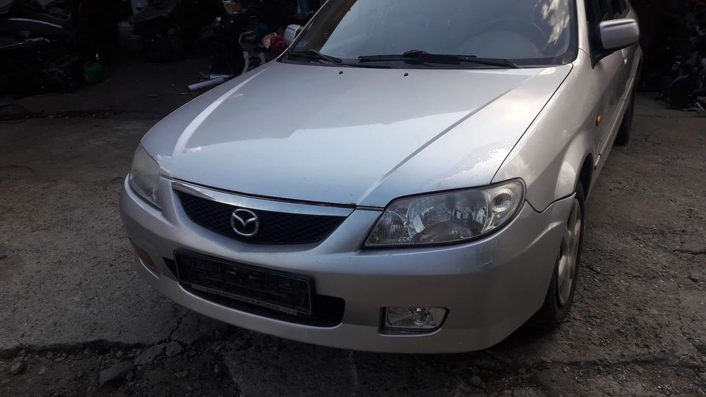 Mazda 323 323f BJ 98-03 Lift  Maska lampa zderzak pas atrapa 22V