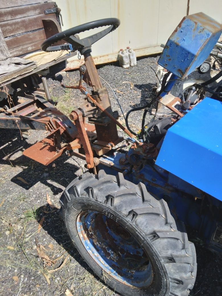 Motocultivador a volante e rabiças