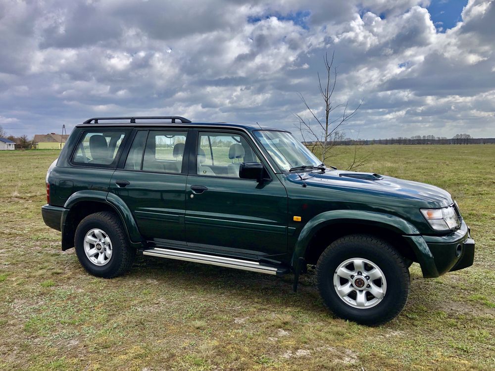 Felgi Nissan Patrol Y61 oryginalne 5 szt + śruby do felg