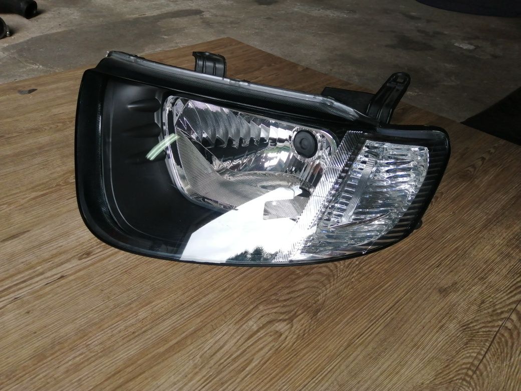 Ótica Mitsubishi L200 Esquerda