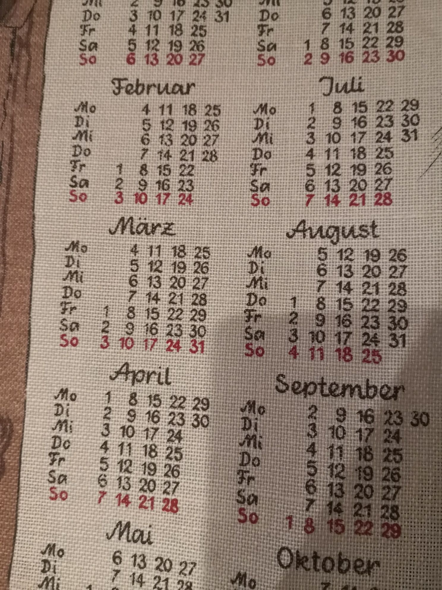 Kalendarz naścienny, materiałowy z 1991 roku / niemiecki / Liebherr