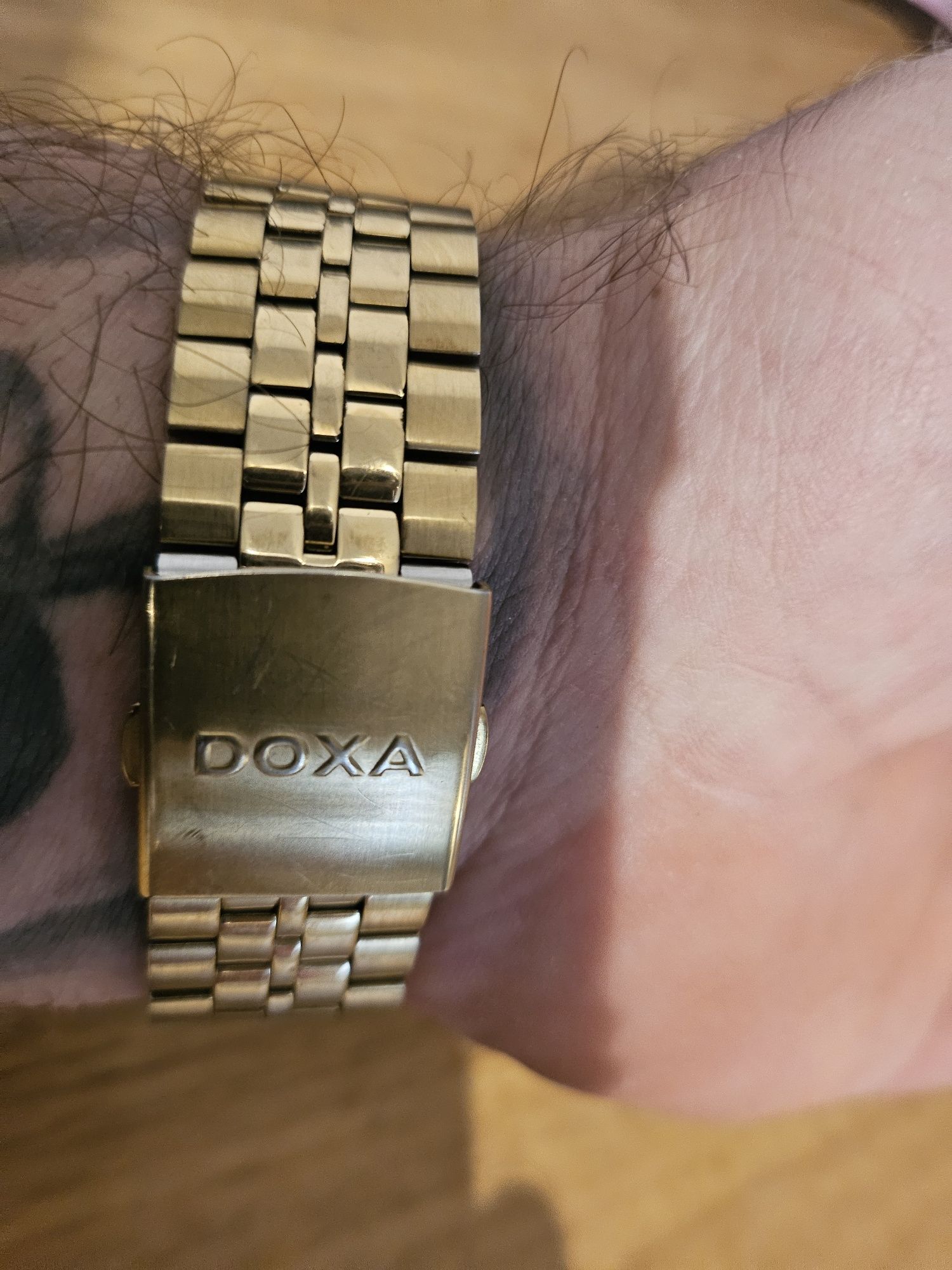 Złoty zegarek Doxa
