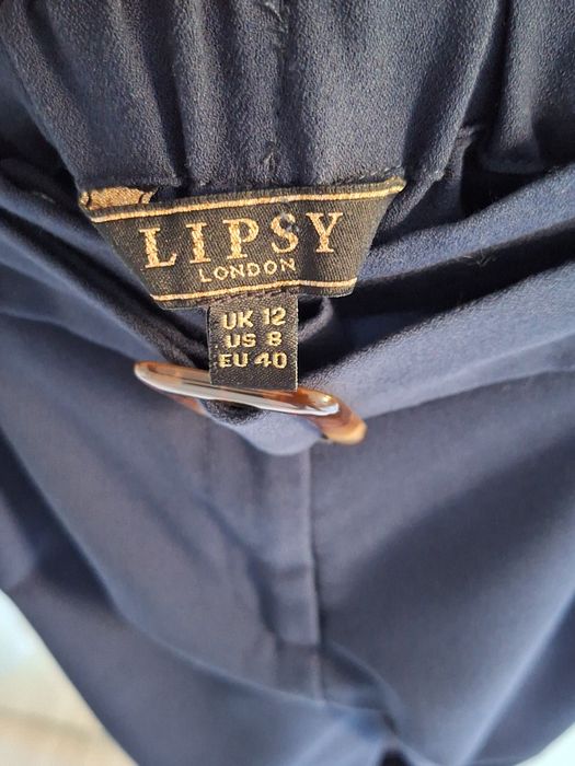 granatowe spodnie eleganckie chinosy w gumkę z paskiem