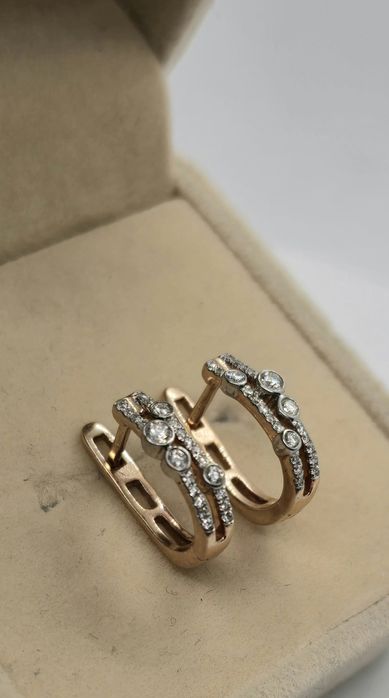 Złote kolczyki z brylantami 0,23 ct