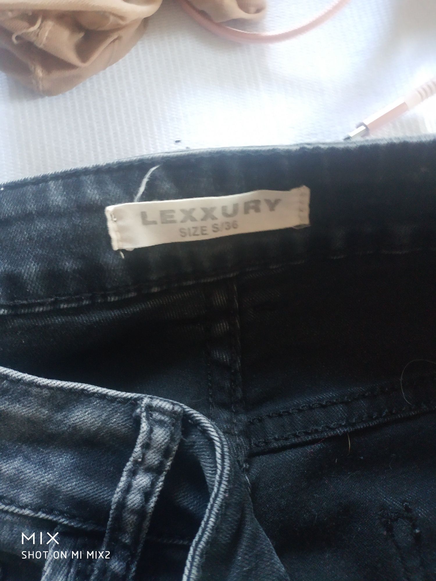 Szare dżinsowe spodnie damskie S. Lexxury.