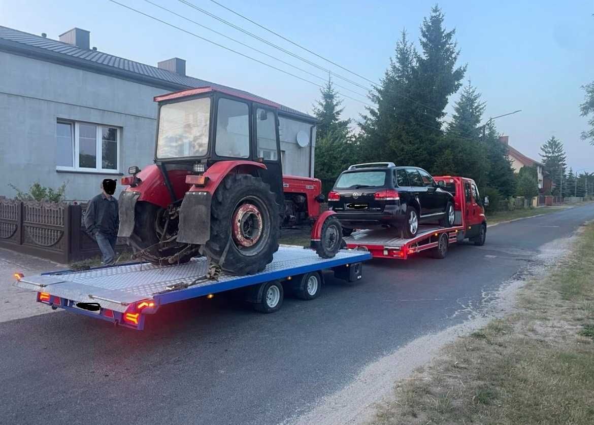 Usługi transportowe    pomoc drogowa Laweta