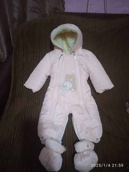 Теплющий,зимовий комбінезон на дівчинку на овчині.