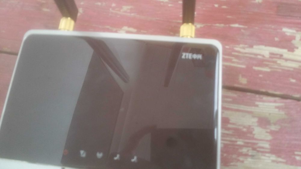 Роутер - Модем  ZTE  IX380