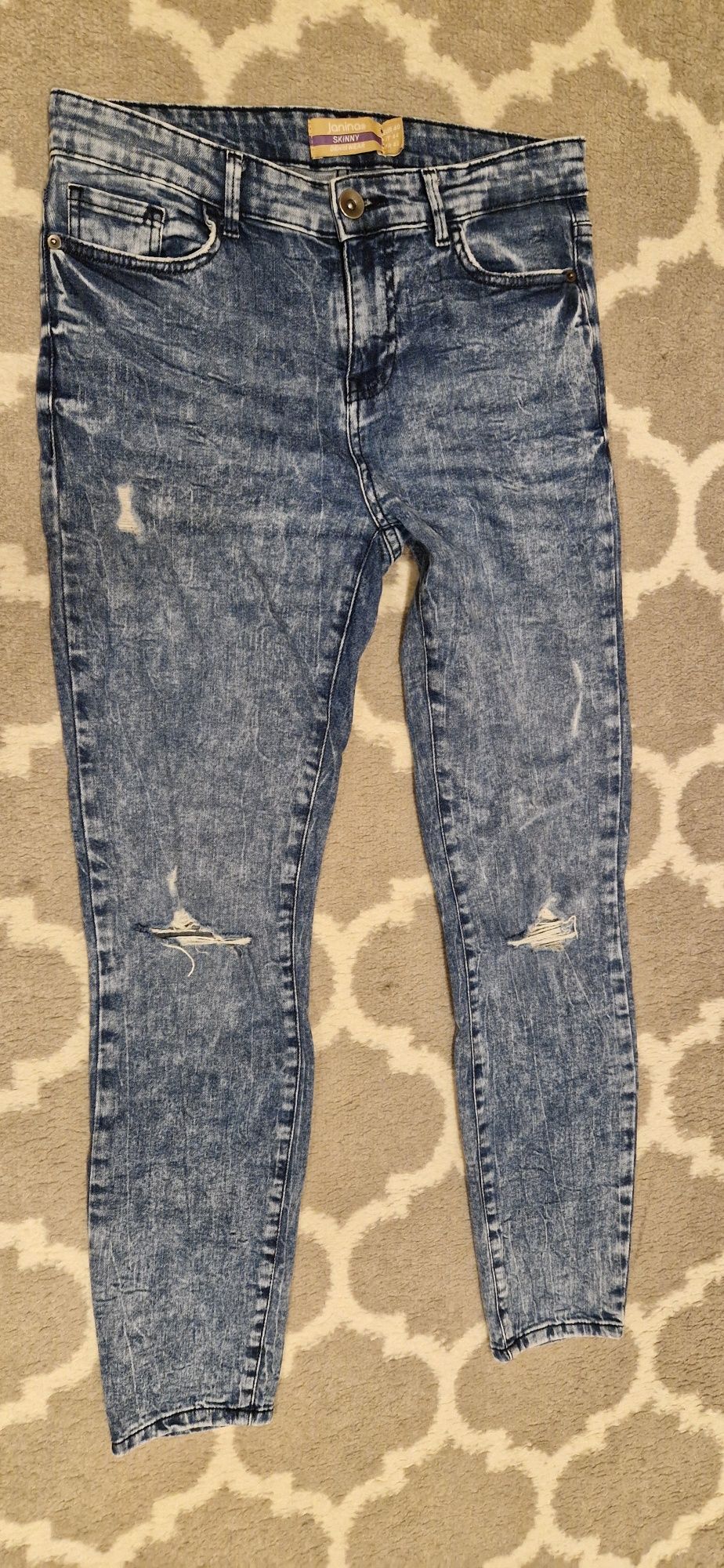 Spodnie jeans z dziurami L 40