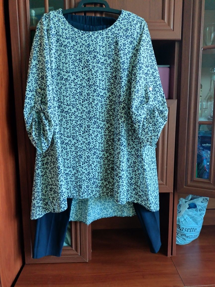 Одяг (плаття,костюм) жіночий
