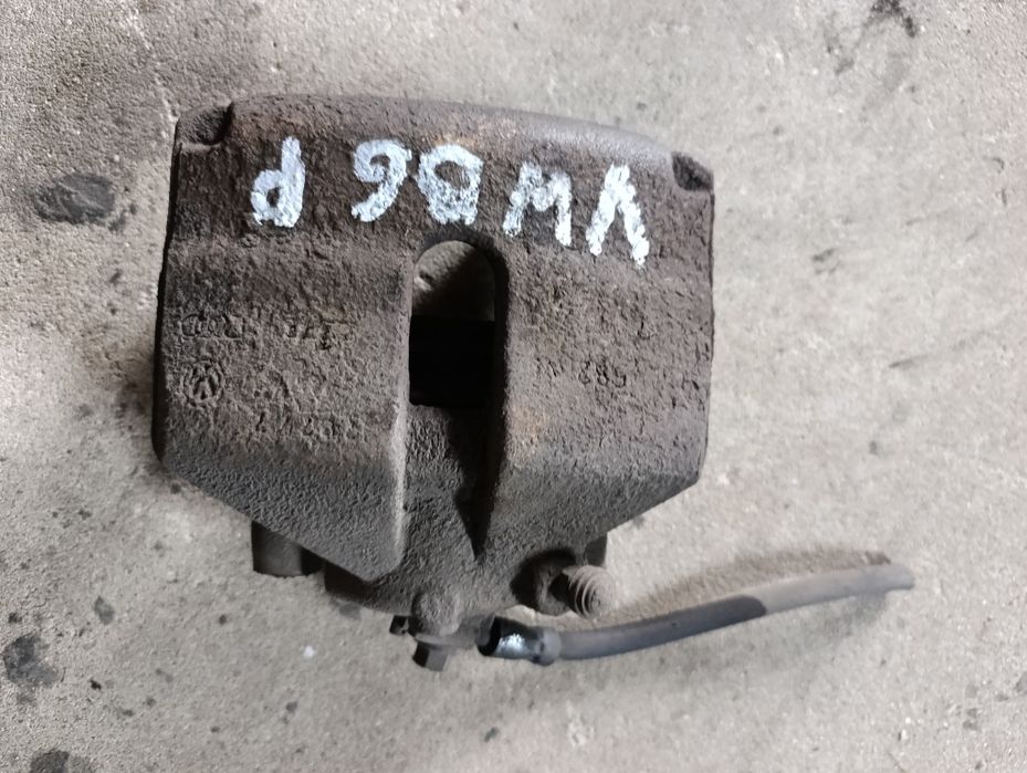 Zacisk hamulcowy przód prawy volkswagen passat b6