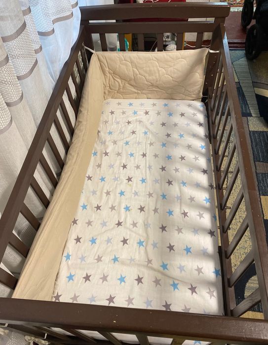 Дитяче ліжко для новонароджених