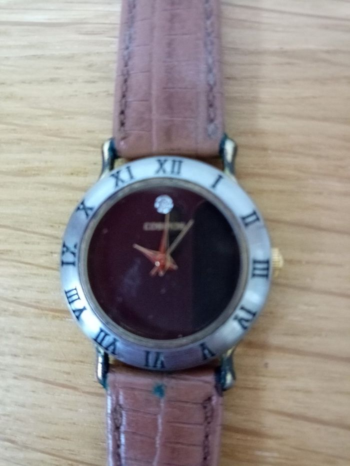Relógio antigo da marca Cosmos