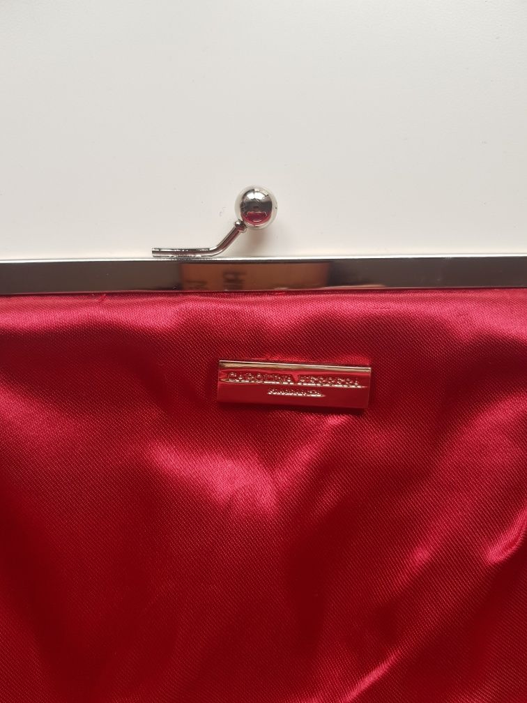 Clutch Carolina Herrera fragances