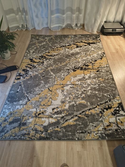 Dywan szaro-biało-złoty 140x200