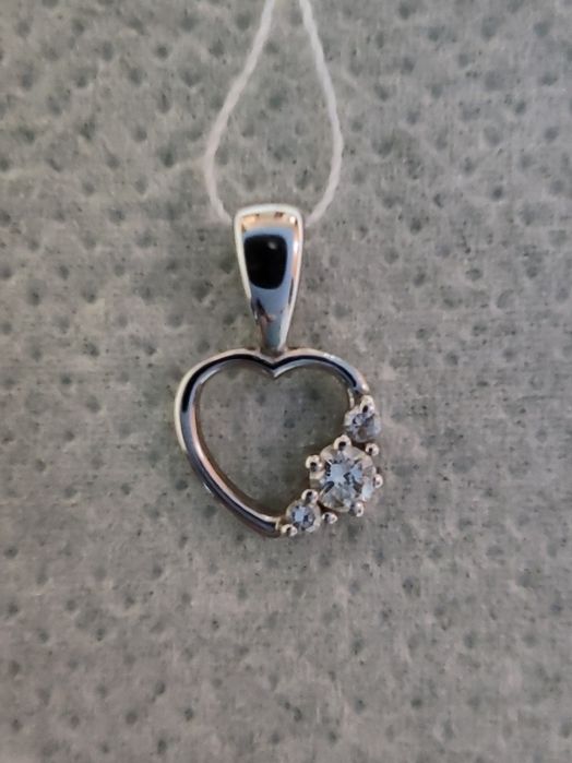 Золотий кулон з діамантами  0.12 ct(природними)