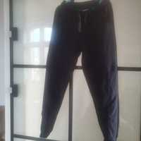 Spodnie dresowe z kieszeniami 146-152 cm