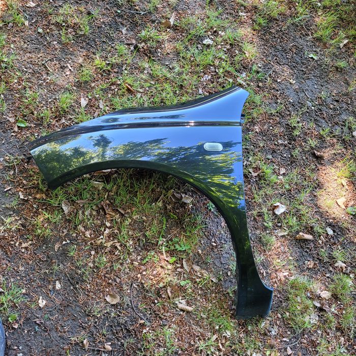 Błotnik przód lewy Nissan Micra III K12 2005r Z11G